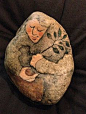 Painted river rock.