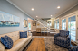 Living room - mid-sized coastal open concept dark wood floor living room idea in DC Metro with gray walls, a standard fireplace, a brick fireplace and a wall-mounted tv