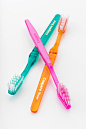 Colgate 'Precision' Toothbrush : Adam led the design program with Human Factors ID, and Frog Design to create the 1st toothbrush with angled and multilength bristles for better access to gums. This product originally launched under the name 'Precision' an