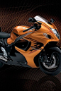orange motorcycle Suzuki Hayabusa
