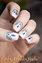 abu dhabi nails, blue and gold nails