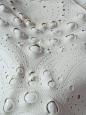 Textiles Design - leather circle cutouts and perforated patterns with stitch detail - white textures; fabric manipulation: 