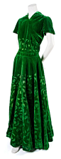 A French Couture Green Velvet Evening Gown, probably 1930s, with geometric cut-away velvet throughout.