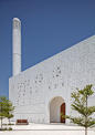 reinterpreted islamic patterns and triangulated geometry clad mosque in UAE