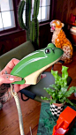 This contains an image of: frog telephone