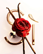 Photo by Armani beauty on July 18, 2023. May be an image of hairpin, rose and text.