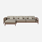 Hermes 2-seater sofa in Canaletto walnut with cane work on the left side and chaise lounge. Upholstered in leather andfabric in fawn and cinnamon, fabric bag on the right armrest. Comes with three large pillows and three small pillows in fauve Taurillon H