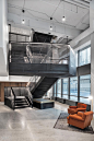 Lebel & Bouliane and Mazen Studio Design Bensimon Byrne's Toronto Office : Chairs by GamFratesi gather on the all-hands area’s oak platform. Photography by Adrien Williams.