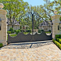 BOXWOOD : This formal residence is located in Highland Park, Texas features intensely manicured gardens, a cobblestone driveway, private motor court and a grand entry gate. 