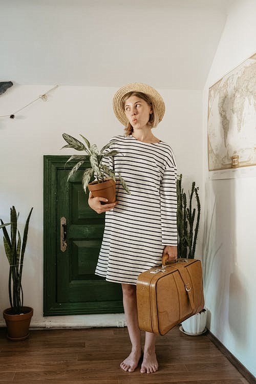 Woman Carrying Pot o...