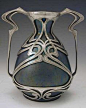 valscrapbook:    Zsolnay ceramic art nouveau vase with polished pewter mount, Hungary, c. 1900   via