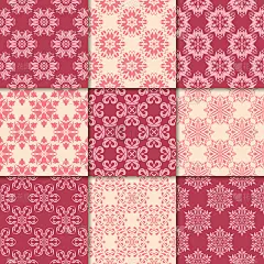 樱桃红和米色的花卉装饰品。无缝模式的集合