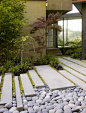 concrete garden paving + rocks.  This is so me!  I love rock & concrete where most others would love to have flowers everywhere.  The simplicity is calming to me.