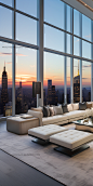 living room's expansive windows frame the city skyline, enhancing the room's grandeur.