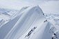 Two skiers on a snowy mountain getting ready to drop in Haines, Alaska. by Adventure Joe on 500px