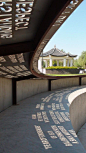 Sunlight shines through laser-cut phrases at the Moving Memories Memorial in Phoenix. The phrases are meant to reflect a range of thoughts from Arizonans affected by 9/11, and were picked after months of research.: 