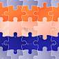 Colorful jigsaw. Seamless puzzle pattern. Autism b