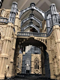 This may contain: a model of a cathedral with arches and doors