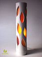 This unique bamboo lamp is very elegant for any home decoration style. It is handmade in our workshop from a natural bamboo pole and colored leaves, and