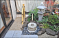small space Japanese garden.  How to raise the soli level  up to sgd.  Good use of different types of rock/gravel: