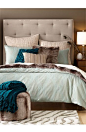 Gorgeous color palette of soft blues and lovely neutrals. Really loving this rug and that headboard!