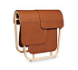 Equilibre d'Hermès, magazine rack Hermes magazine rack in solid natural maple wood. Bag in fauve taurillon H leather Measures L 21.7" x W 31" x H 55"