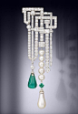 Lot 183 – ?A magnificent and rare art deco natural pearl, emerald and diamond brooch, by Van Cleef 