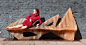 Oleg Soroko has designed an organically shaped, sculptural wooden bench named the Falcon Bench, inspired by the bird of the same name.