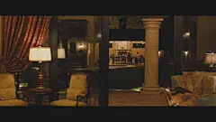前景架设了两站台灯形成光区，同时被照亮的玻璃反射出画外的空间，增加了空间深度，中景很黑没有打光，让后景的光区很突出