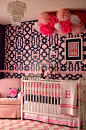 This chic nursery is full of textures and patterns. #pink #baby #nursery