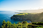 Free photo amazing view of a green cliff near the sea in the azores archipelago, portugal