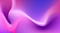 a blurry image of a pink and purple background