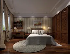 业主背景:男业主,某私企董事,45岁左右;女业主,某制衣企业董事,40岁左右;女儿,就读大学,儿子就读小学;一常住保姆.本案业主性格属于思维缜密，时尚、有独立的个性和文化品味,注重环保,对益居生活设备比较关注，要求空间规划合理,有足够的储物空间;公共空间低调雅致,私密空间温馨舒适.
设 计 师：高欣
建筑面积：400㎡
主要用材：石材拼花、实木复合地板、欧式壁纸、花地毯
新古典主义的设计风格其实是经过改良的古典主义风格。欧洲文化丰富的艺术底蕴，开放、创新的设计思想及其尊贵的姿容，一直以来颇受众人喜爱与追求