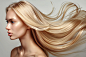 beautiful-blonde-woman-with-long-flowing-hair-viewed-from-back-against-white-background