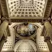 This may contain: an ornate ceiling with paintings on it