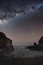 July 2010 The Milky Way Over Pulpit Rock Credit & Copyright: Alex Cherney (Terrastro) This image tkn only last month fr Cape Schank, Victoria, Australia. The frame is highlighted by a dreamlike lagoon, 2 galaxies, & 10's of 1000's of stars. The ro