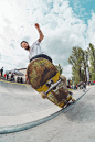 Man Playing Skateboard on Ramp