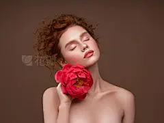Young beautiful womanYoung beautiful woman. Professional make-up and hair style.