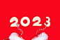 2023年新年数字与节日手套的创意背景。明信片,祝贺,横幅。素材图片