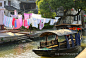 Sunning bed sheets - Xitang water village