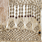 Macrame Wall Hanging with varnished wood beads : This modern macrame wall hanging comes hung on a piece of bamboo and is adorned with varnished wood beads.  It is made with over 300 feet of
