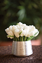 Simple, modern yet classic centerpiece of a single floral variety.: 