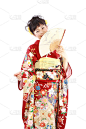日本妇女，穿着和服，拿着扇子