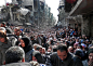 The best photos of 2014, Part 1 - The Boston Globe: This picture taken on Jan. 31, 2014, and released by the UNRWA, shows residents of the besieged Palestinian camp of Yarmouk, queuing to receive food supplies, in Damascus, Syria. A United Nations officia