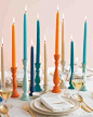 Try a modern twist at your Thanksgiving table with a variety of bright colors, like blues and warm orange tones!