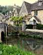 Cotswold style houses along the Bybrook river in Castle Combe, England