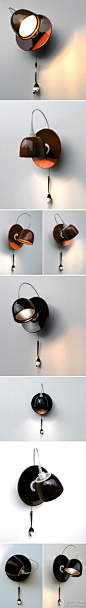 #玻璃设计#『咖啡杯壁灯』由Ingo Maurer 和Fabien Dumas联合设计的Light Au Lait Wall Lamp，将水平放置的咖啡杯搬到了墙上，碟子与墙固定，杯子变成玻璃灯罩，再为其加装一个灯泡，一盏别致壁灯便诞生啦。一个可爱的小汤勺则用来控制开关，是否让你心动了呢？！