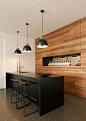 A modern and simple home bar design.  This style could work well in a kitchen or basement.