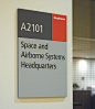 Adobe Portfolio Signage wayfinding system Aerospace Interior exterior overhead corporate