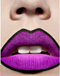 Dramatic black lined bright purple matte lips